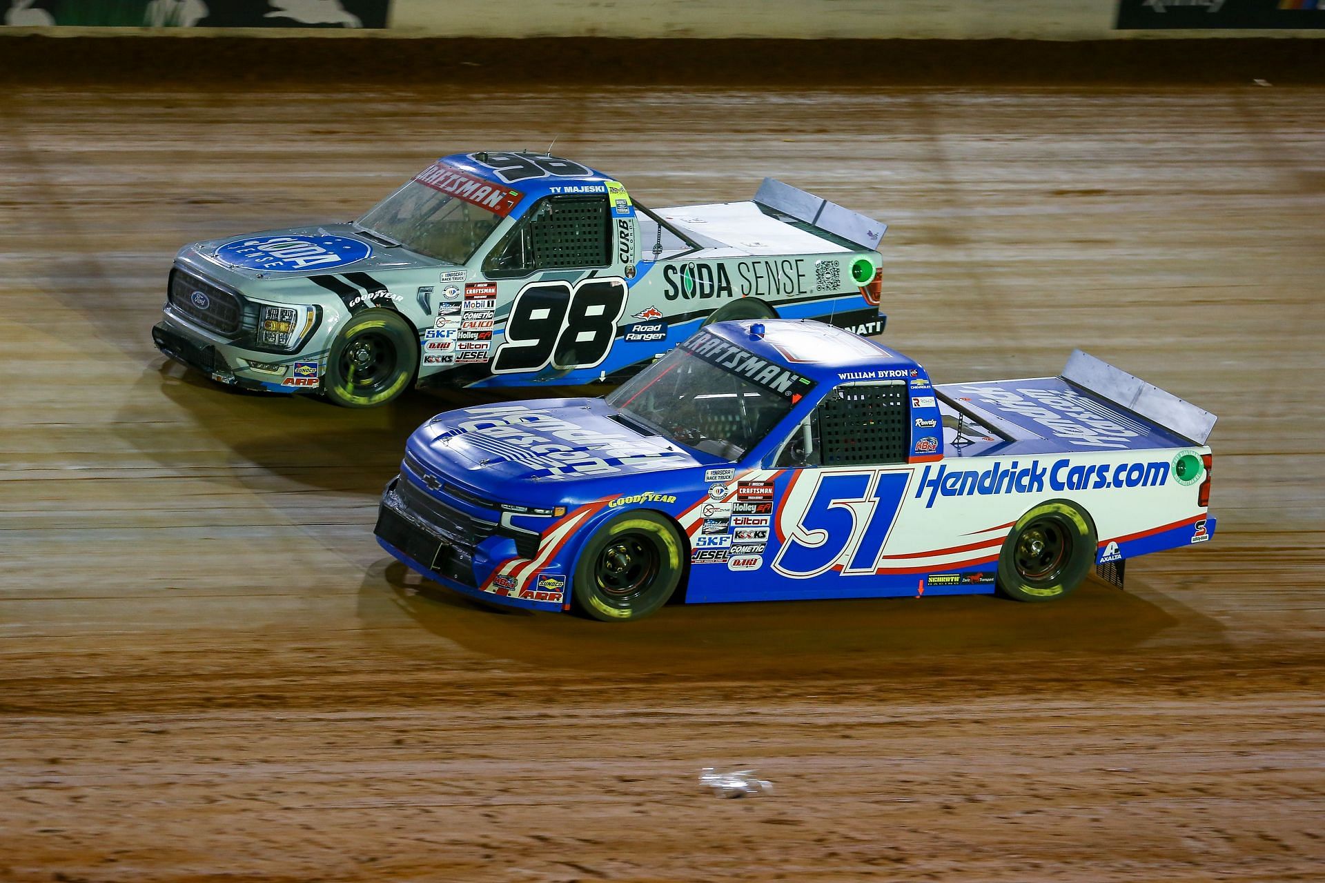 William Byron (51) and Ty Majeski (98) during the 2023 NASCAR Craftsman Truck Series race at Bristol. Source: Getty